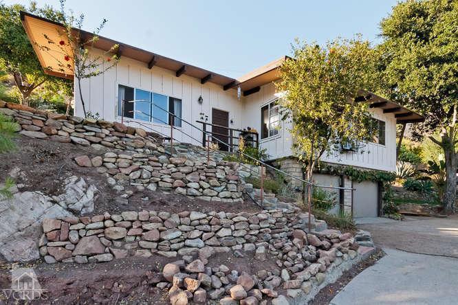 1777 Foothill Road Ojai, CA 93023 - Photo 1 of 15 a front view of a house with a yard