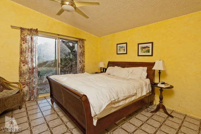1777 Foothill Road Ojai, CA 93023 - Photo 11 of 15 a bed sitting in a bedroom next to a window