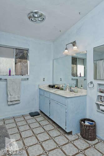 1777 Foothill Road Ojai, CA 93023 - Photo 13 of 15 a spacious bathroom with a sink a mirror and a shower