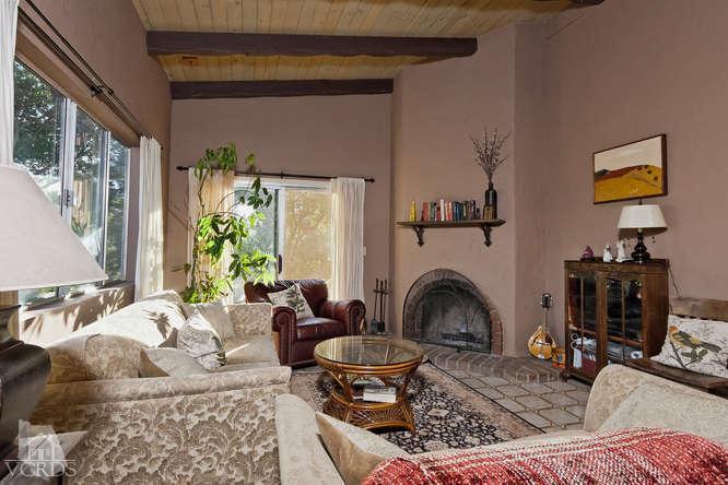 1777 Foothill Road Ojai, CA 93023 - Photo 3 of 15 a living room with furniture and a fireplace