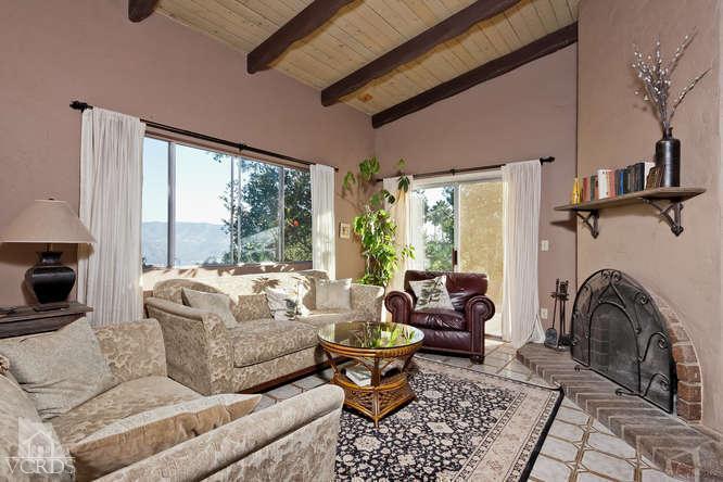 1777 Foothill Road Ojai, CA 93023 - Photo 4 of 15 a living room with furniture and a floor to ceiling window