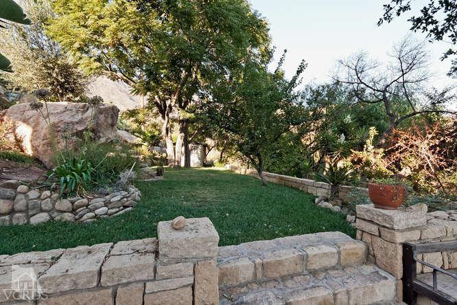 1777 Foothill Road Ojai, CA 93023 - Photo 7 of 15 a view of a table and chairs in the garden