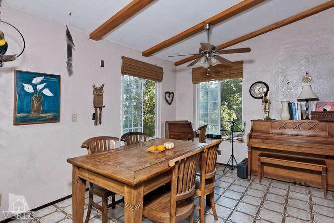 1777 Foothill Road Ojai, CA 93023 - Photo 10 of 15 a view of a dining room with furniture window and wooden floor