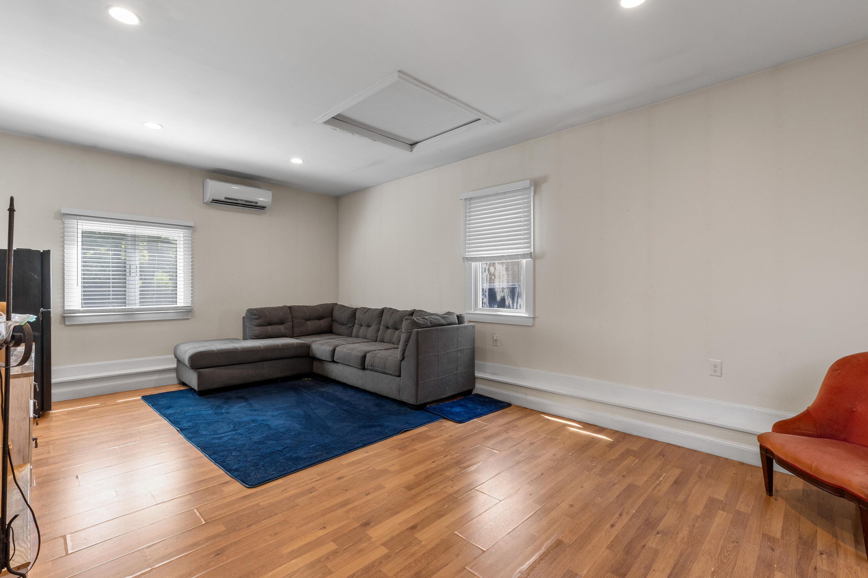 30 Sheffield Place Mashpee, MA 02649 - Photo 22 of 38 a living room with furniture and a wooden floor