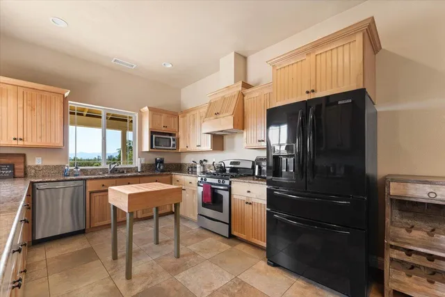 a bathroom with a bathtub a toilet and a shower