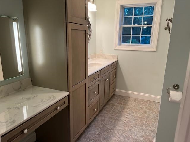 204 Stover Shop Road Churchville, VA 24421 - Photo 24 of 52 a bathroom with a granite countertop sink a toilet and a bathtub
