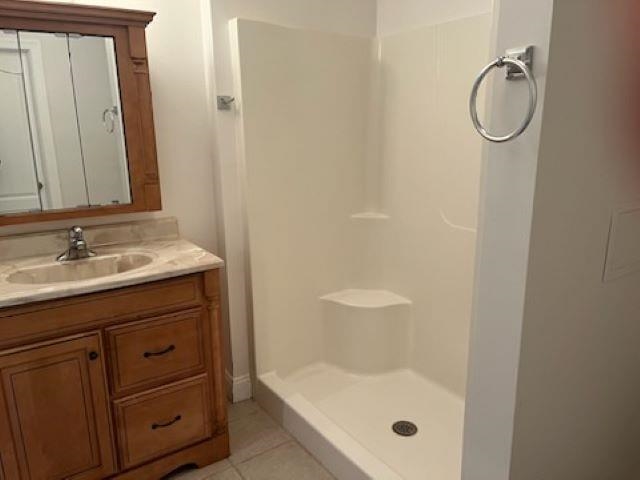 204 Stover Shop Road Churchville, VA 24421 - Photo 46 of 52 a bathroom with a granite countertop sink a mirror and a shower
