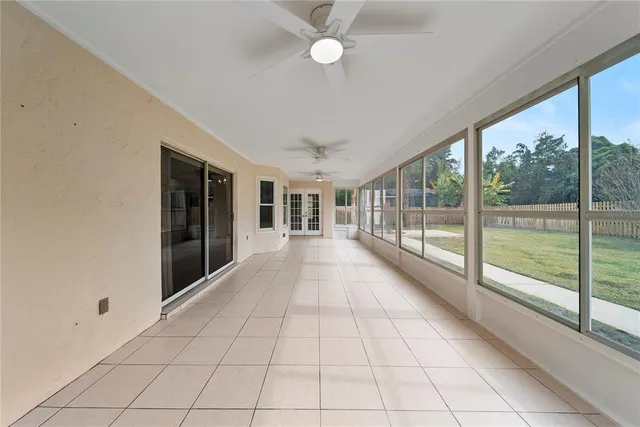a view of a room with windows