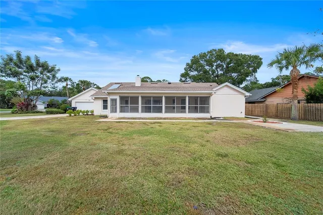 a house view with a garden space
