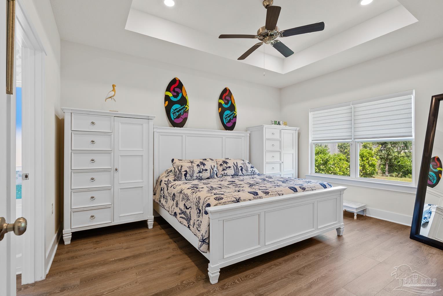 5773 Danbury Boulevard Pace, FL 32571 - Photo 14 of 34 a bed room with a bed and a window