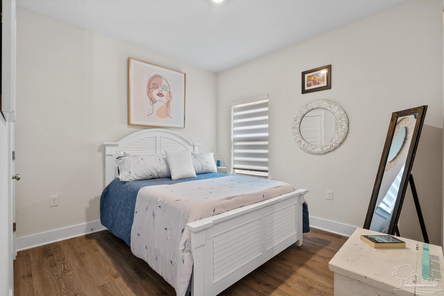 5773 Danbury Boulevard Pace, FL 32571 - Photo 23 of 34 a room with a bed and a window