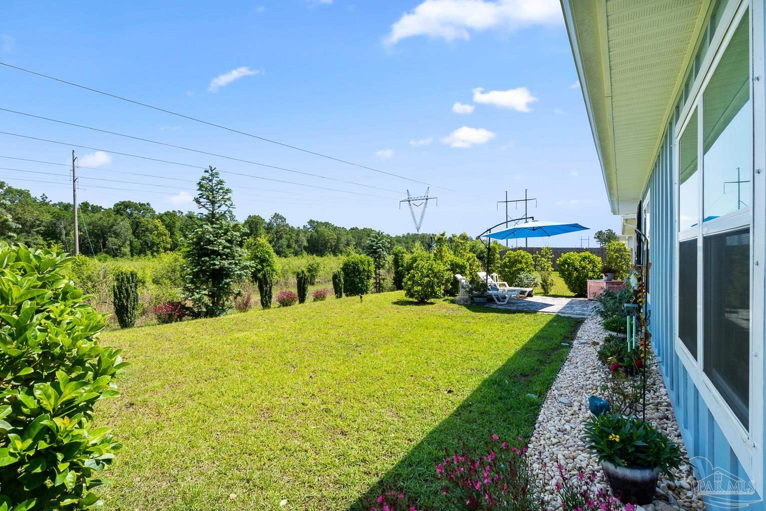 5773 Danbury Boulevard Pace, FL 32571 - Photo 33 of 34 a view of back yard of the house
