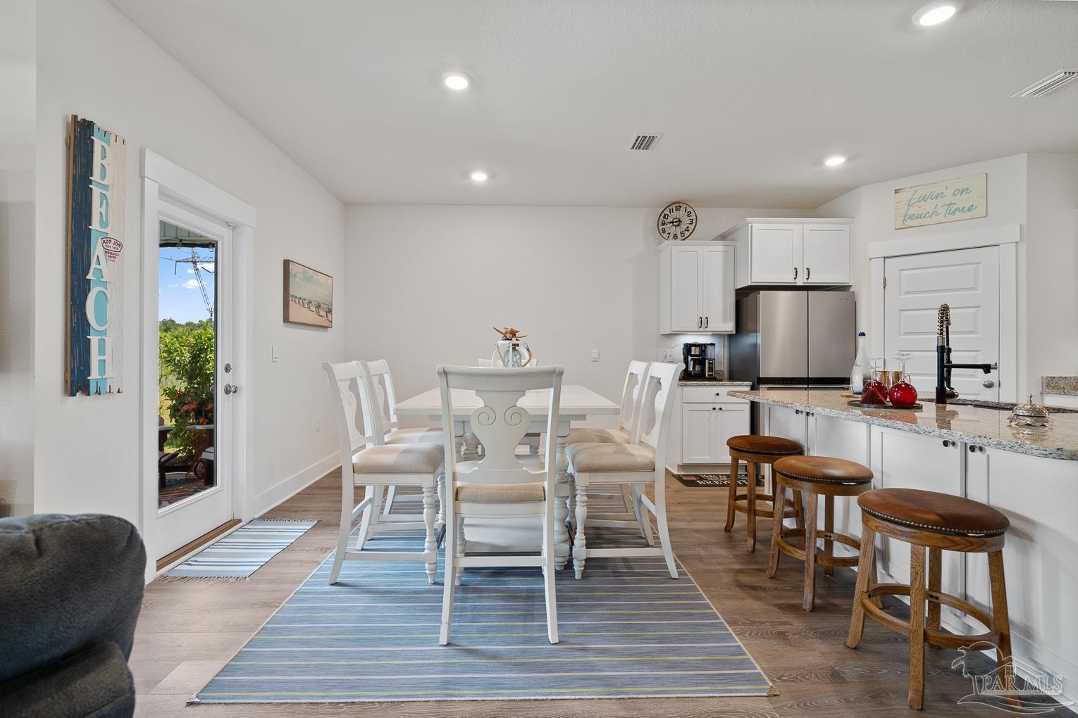 5773 Danbury Boulevard Pace, FL 32571 - Photo 8 of 34 a view of a dining room with furniture