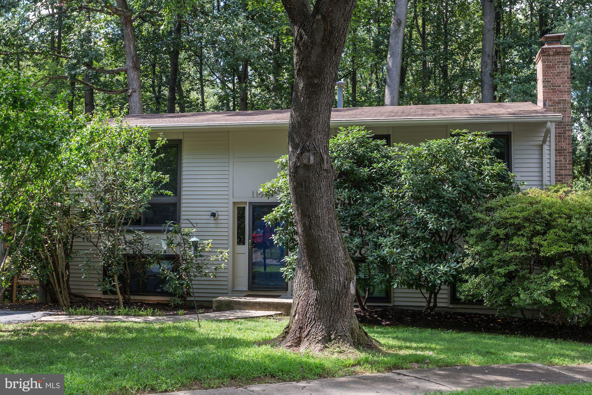 11570 Embers Court Reston, VA 20191 - Photo 1 of 30 a view of a house with a backyard