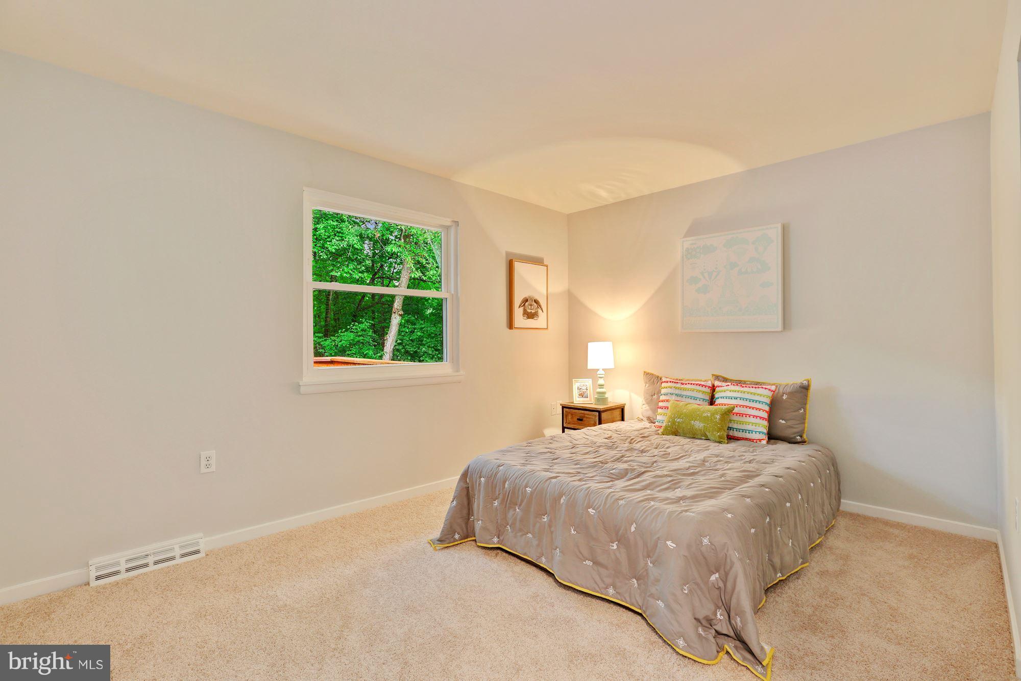 11570 Embers Court Reston, VA 20191 - Photo 15 of 30 a bedroom with a bed and window