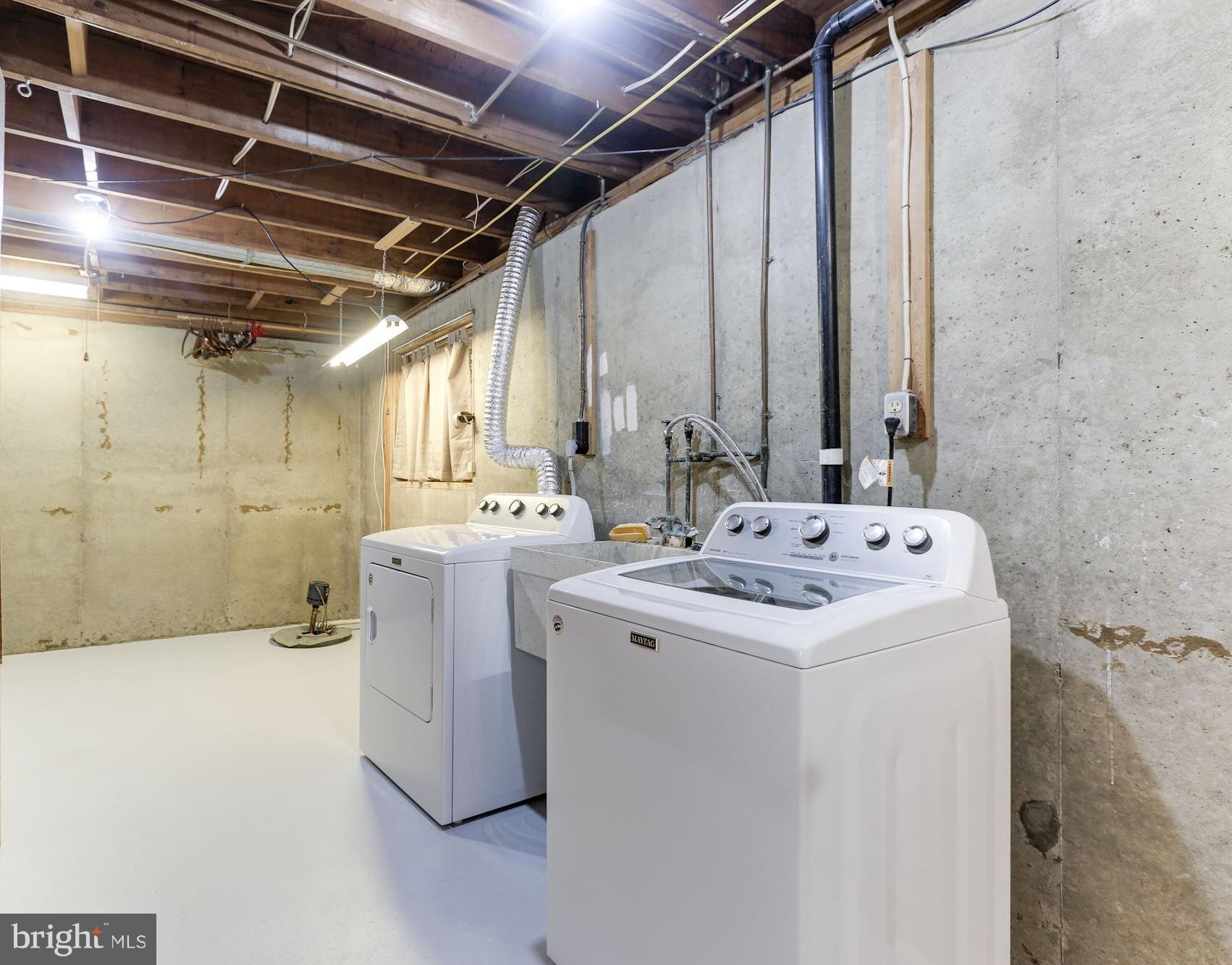 11570 Embers Court Reston, VA 20191 - Photo 18 of 30 a utility room with dryer and washer