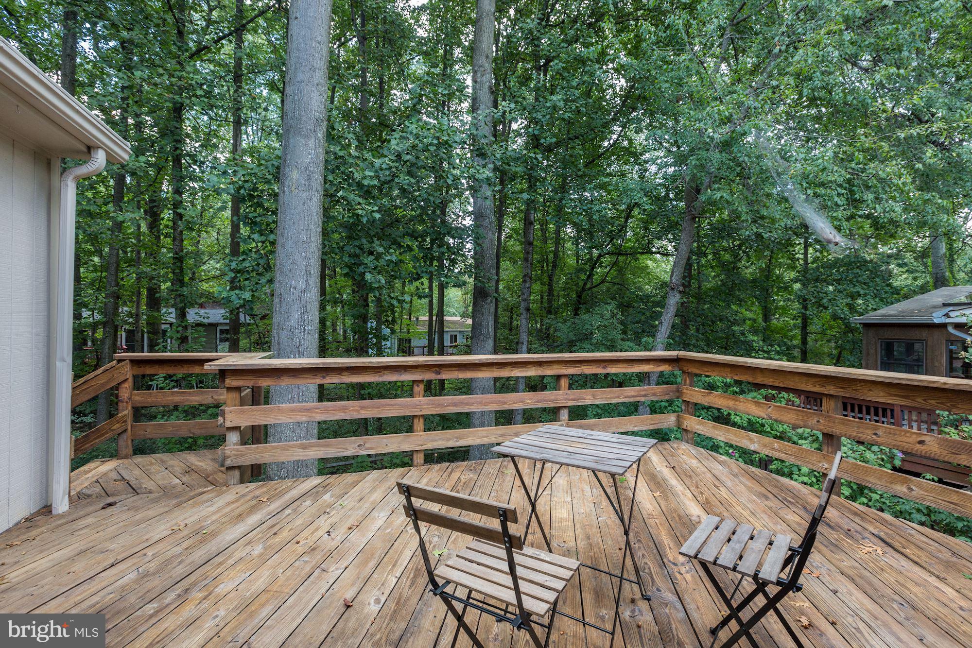 11570 Embers Court Reston, VA 20191 - Photo 3 of 30 a view of balcony with wooden floor and fence
