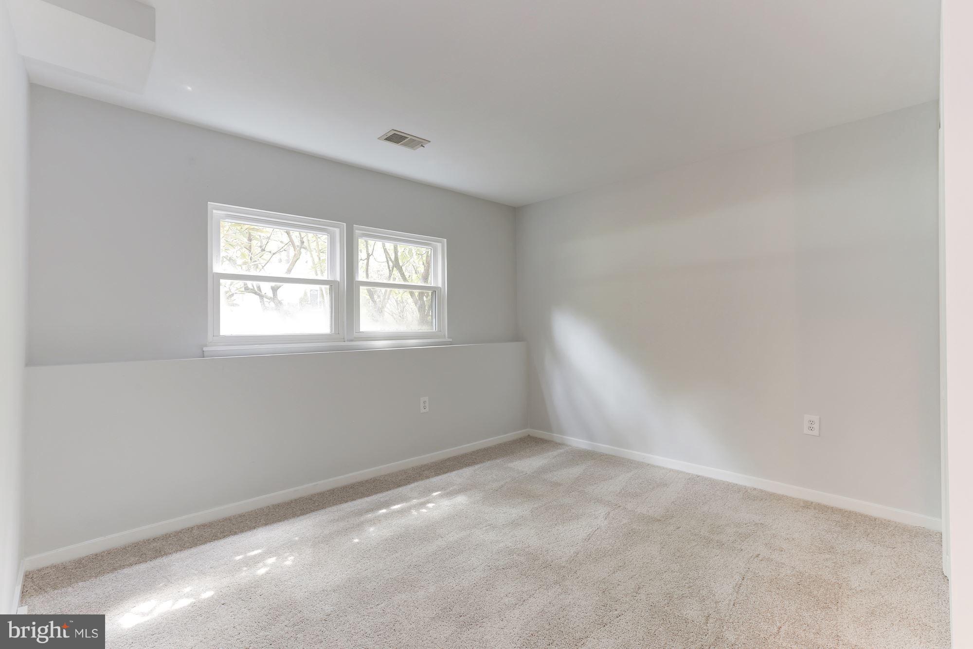 11570 Embers Court Reston, VA 20191 - Photo 23 of 30 an empty room with windows