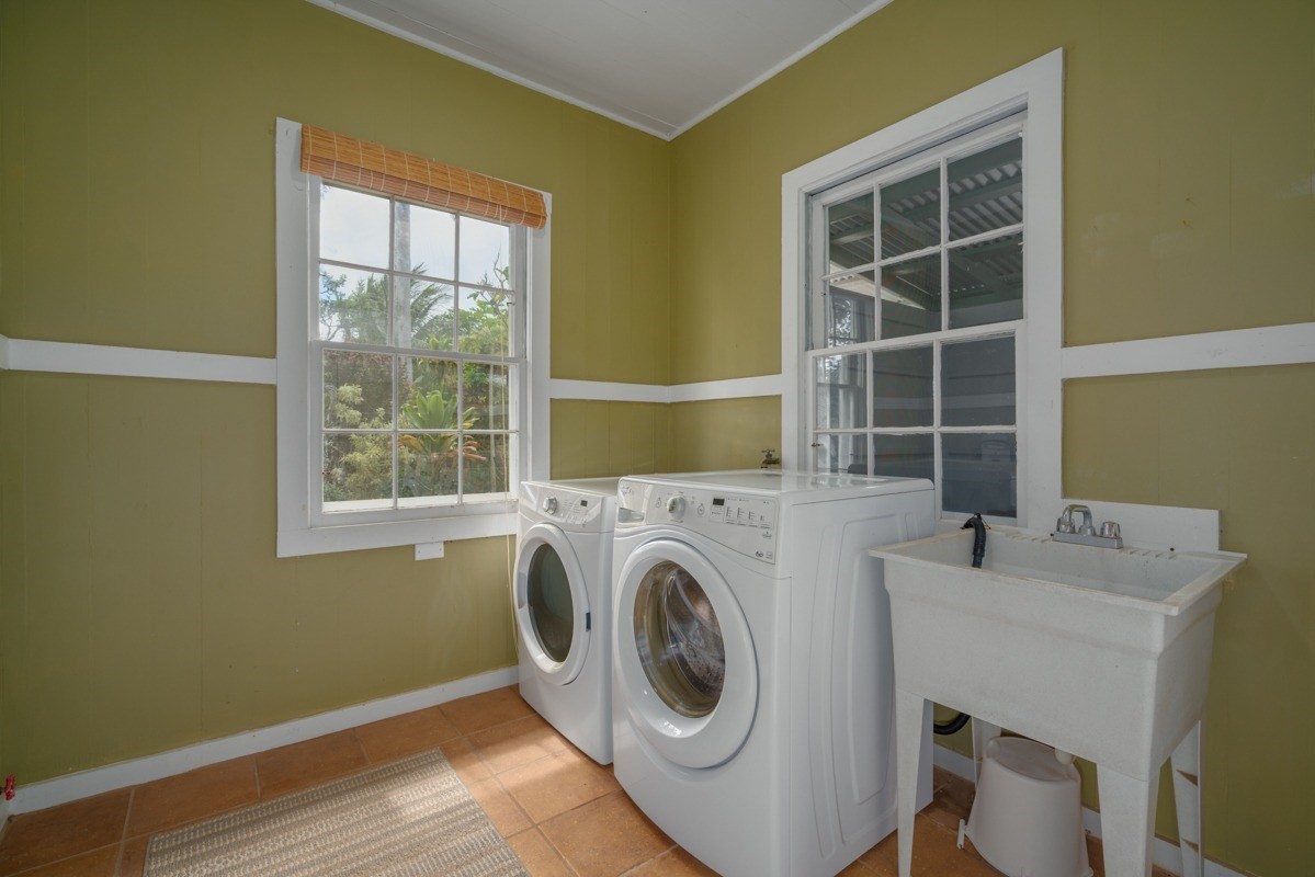 48-5263 Kukuihaele Road Honokaa, HI 96727 - Photo 13 of 30 a utility room with dryer and washer