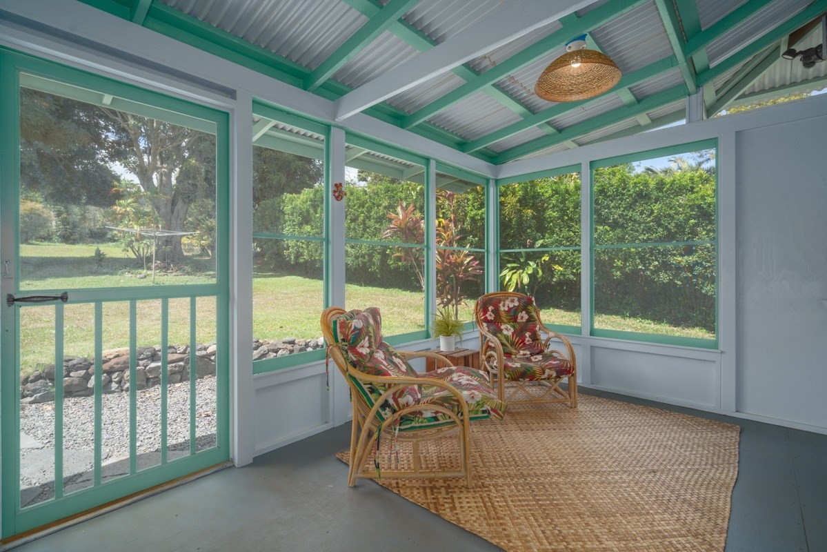 48-5263 Kukuihaele Road Honokaa, HI 96727 - Photo 14 of 30 a dining room with furniture and a garden