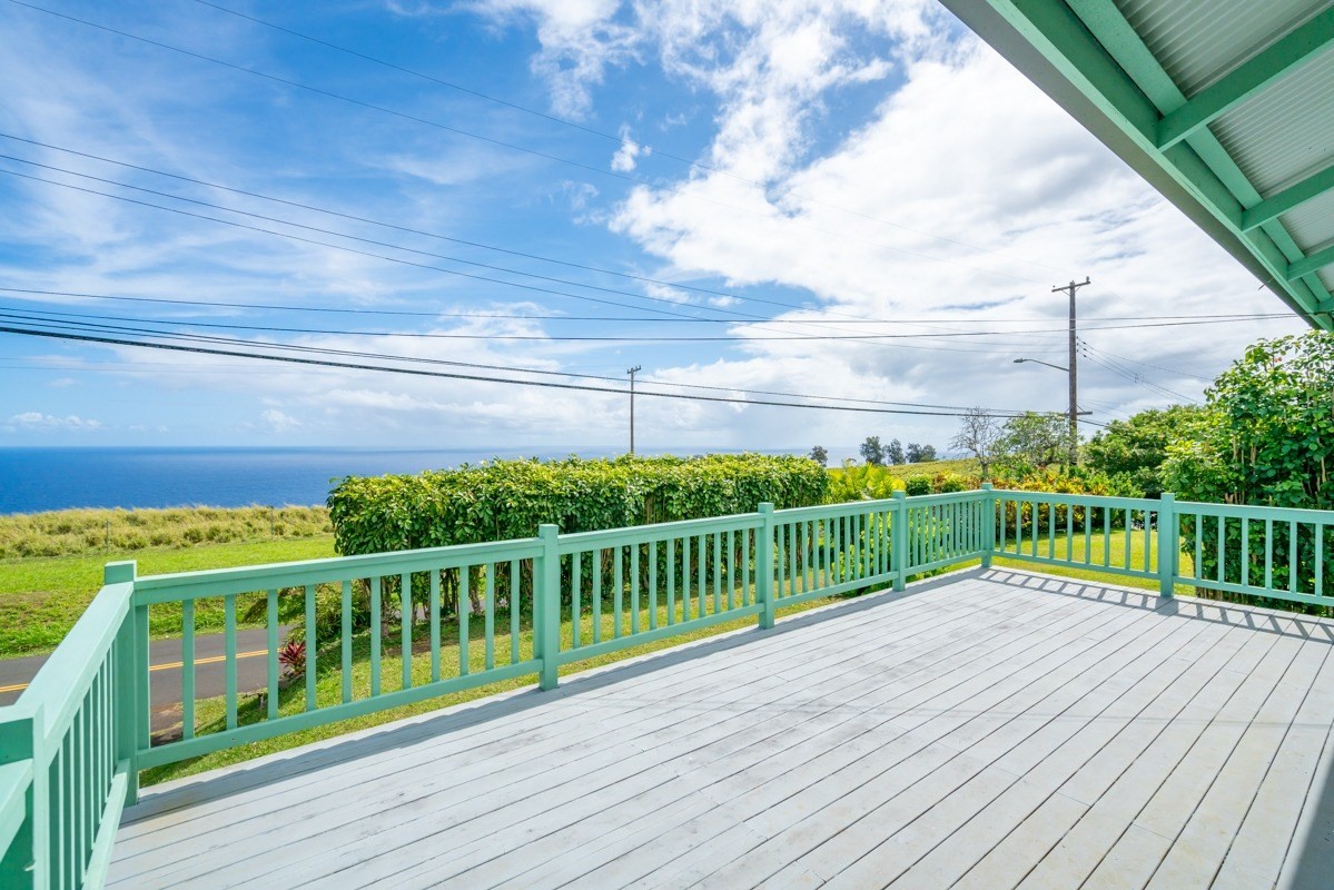48-5263 Kukuihaele Road Honokaa, HI 96727 - Photo 16 of 30 a view of a balcony with wooden floor