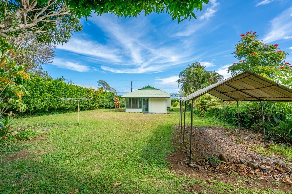 48-5263 Kukuihaele Road Honokaa, HI 96727 - Photo 21 of 30 a view of a house with a yard and potted plants