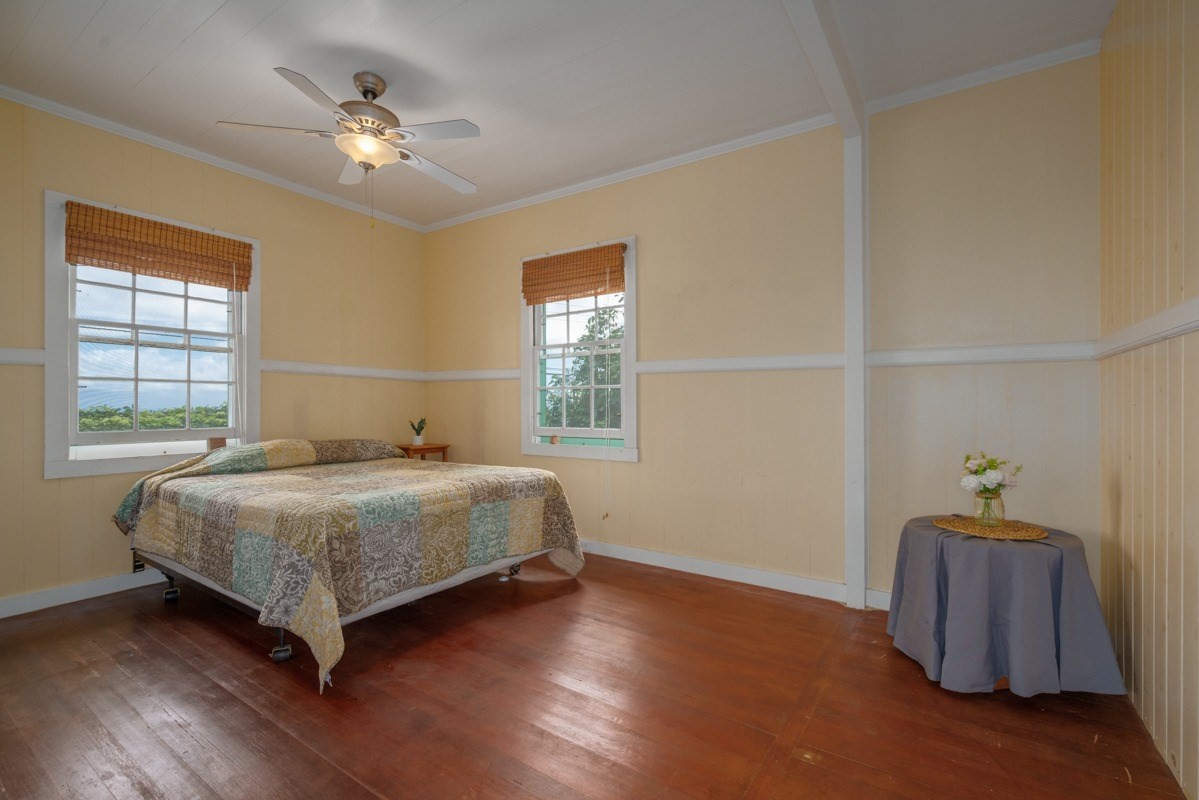 48-5263 Kukuihaele Road Honokaa, HI 96727 - Photo 7 of 30 a bedroom with a bed and a window