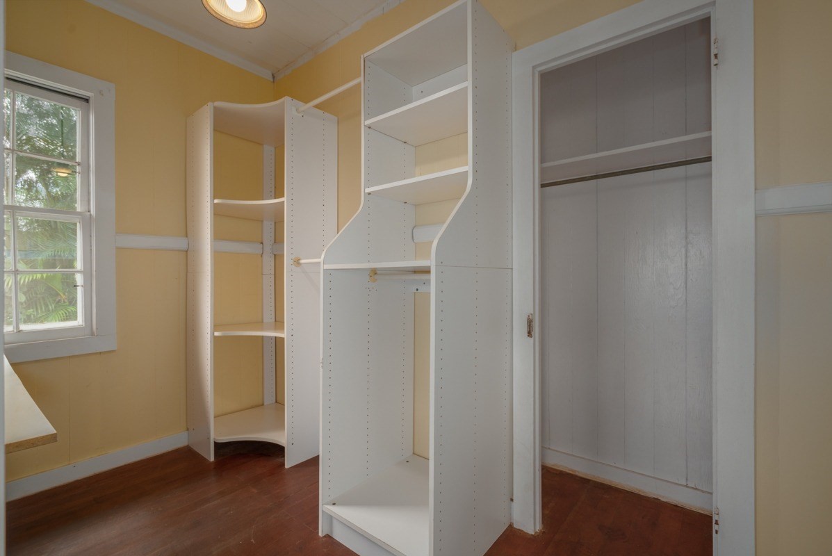 48-5263 Kukuihaele Road Honokaa, HI 96727 - Photo 9 of 30 a view of an empty room with wooden floor and a window