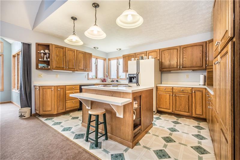 108 Castile Ridge Road Waynesburg, PA 15370 - Photo 11 of 25 The kitchen has beautiful custom cabinetry that takes advantage of the ample space for tons of storage!