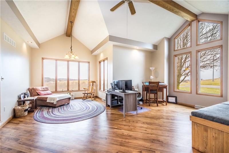 108 Castile Ridge Road Waynesburg, PA 15370 - Photo 13 of 25 The family room, office or set this as the dining room... anyway you use this flexible space it's gorgeous with honey-colored hardwoods, vaulted ceilings, and large windows!