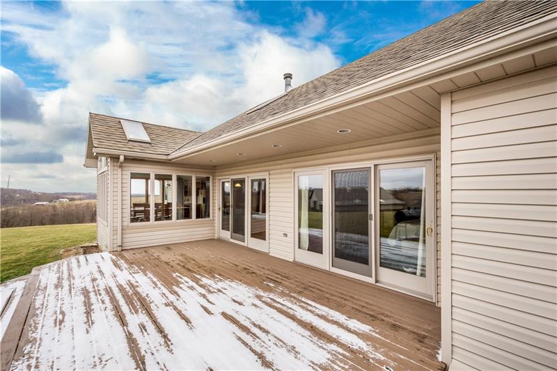 108 Castile Ridge Road Waynesburg, PA 15370 - Photo 21 of 25 Outside, a large patio is accessed from the living room and master bedroom easily.