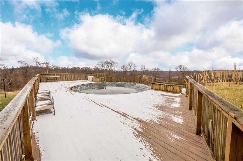 108 Castile Ridge Road Waynesburg, PA 15370 - Photo 22 of 25 Enjoy the summer months in your private pool and hot tub, both located on your deck.