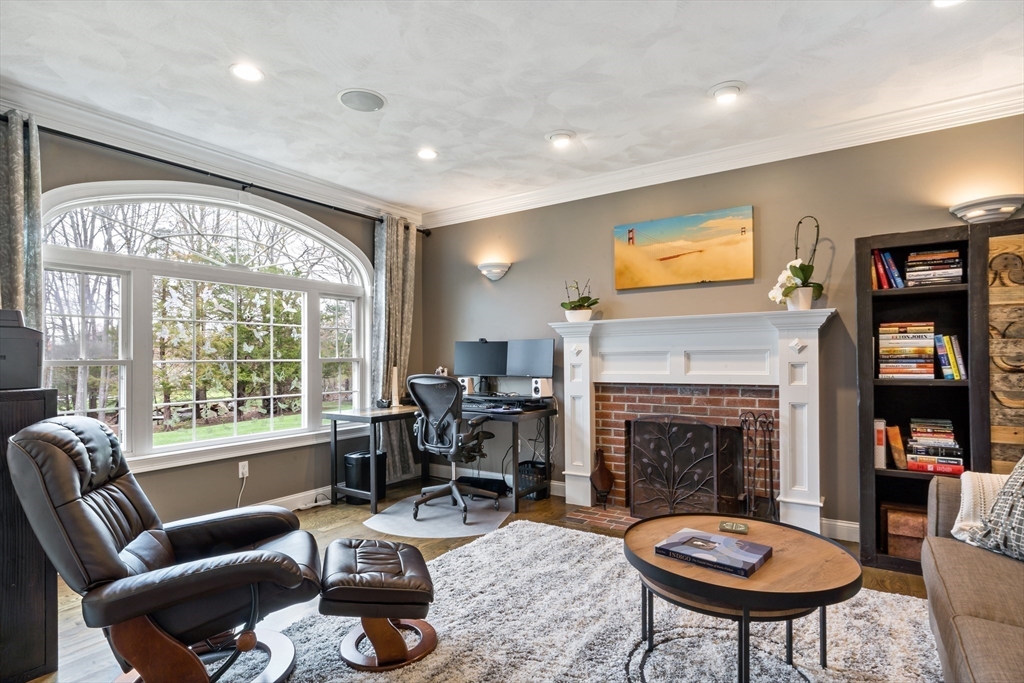 9 Round Farm Road Rehoboth, MA 02769 - Photo 7 of 41 a living room with furniture a window and a fireplace