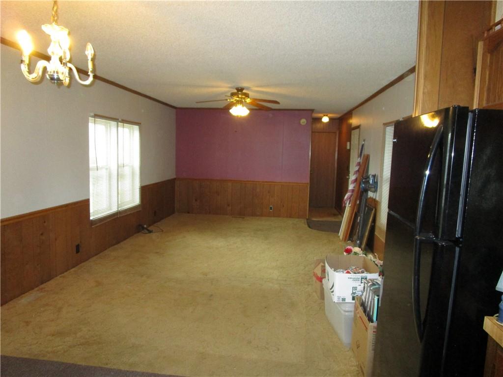 69 South Summit Road Greenville, PA 16125 - Photo 3 of 15 a view of a livingroom with a ceiling fan and window