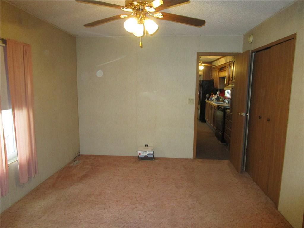 69 South Summit Road Greenville, PA 16125 - Photo 4 of 15 an empty room with windows and closet