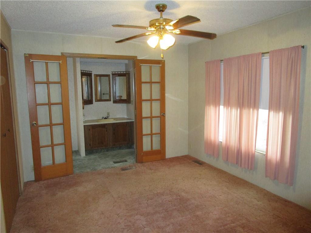 69 South Summit Road Greenville, PA 16125 - Photo 8 of 15 a view of an empty room with a window