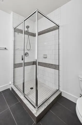 a front view of a house with a yard and table and chairs