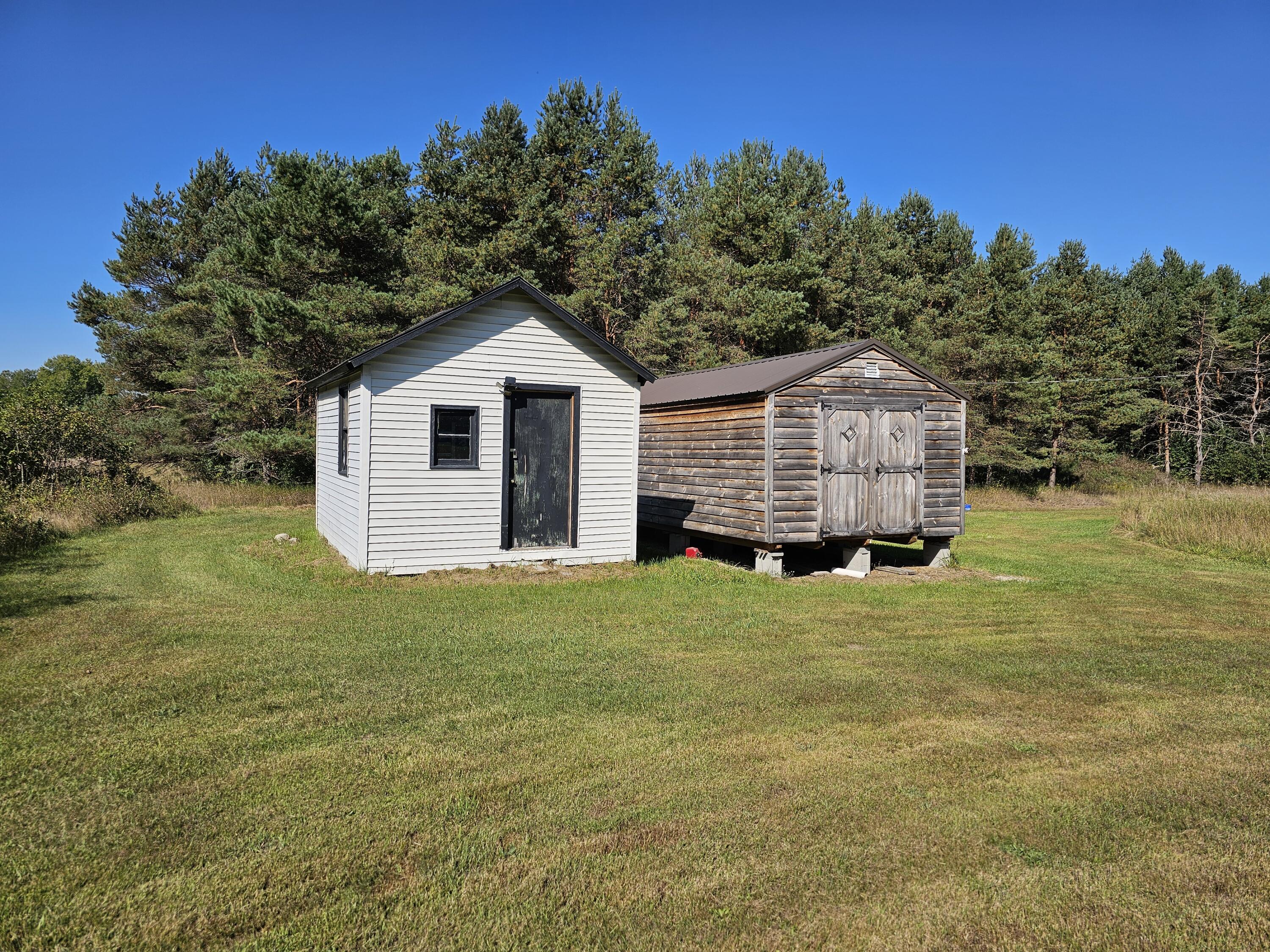 15410 Johnson Road Kaleva, MI 49645 - Photo 11 of 34 bunkhouse-living