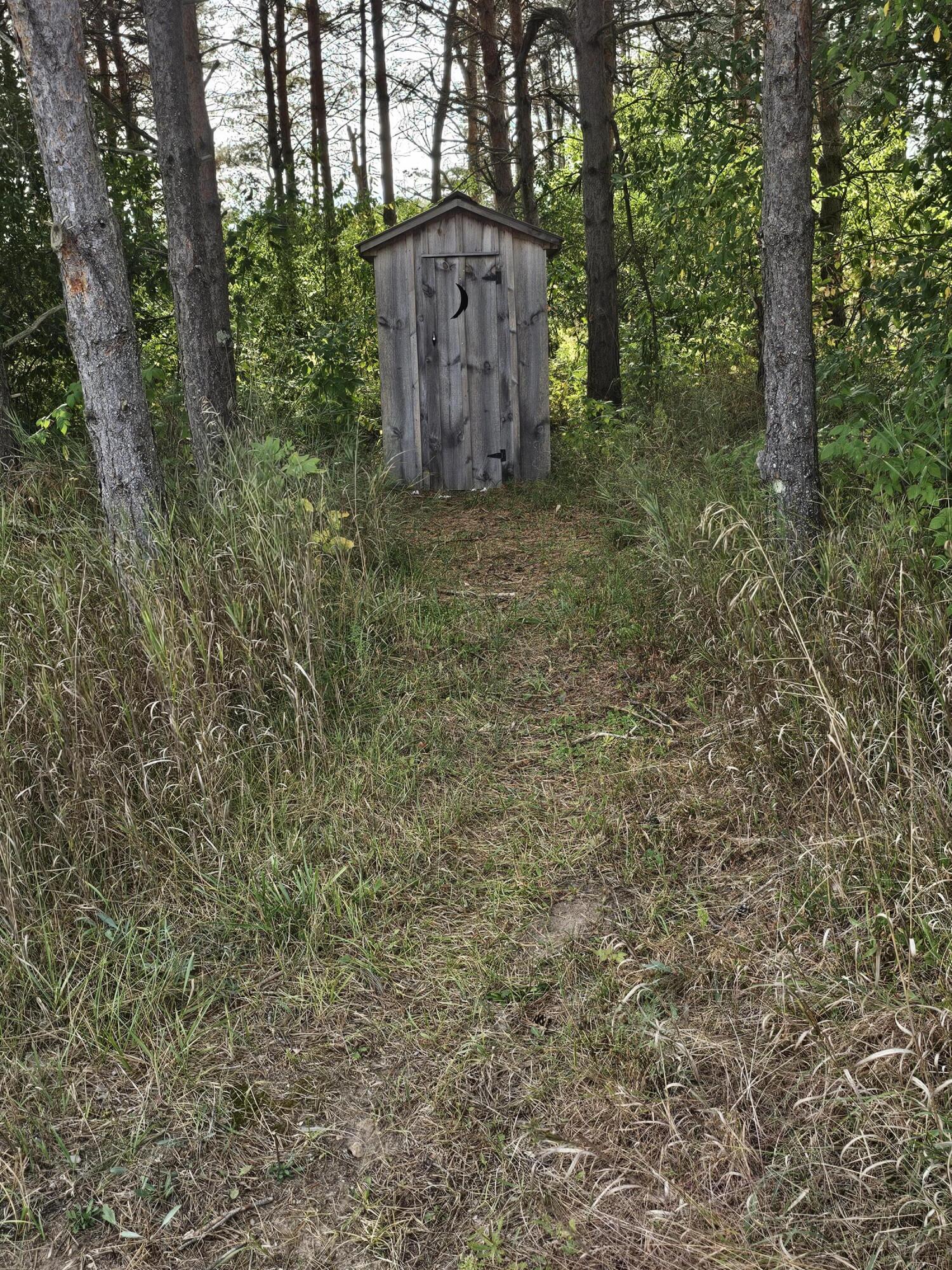 15410 Johnson Road Kaleva, MI 49645 - Photo 31 of 34 outhouse