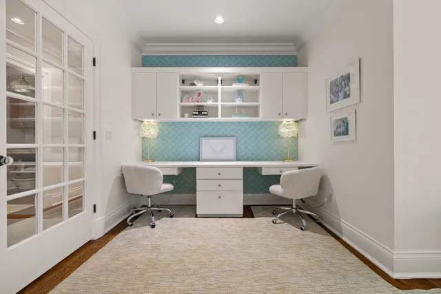 a workspace with furniture and a window