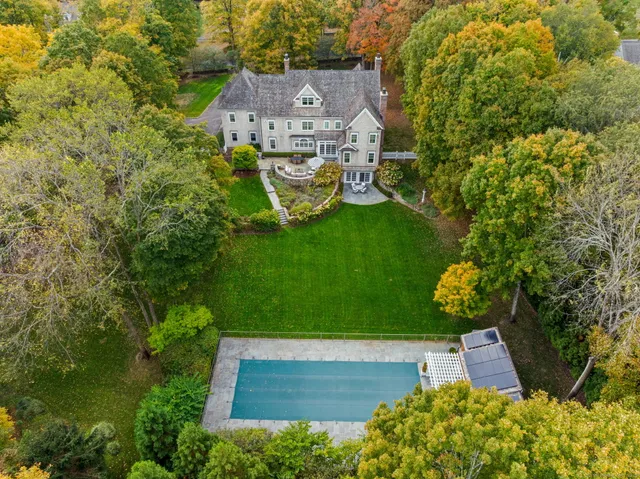an aerial view of a house with a garden