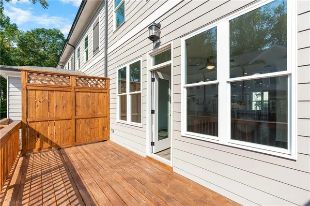a view of a brick house with a large window