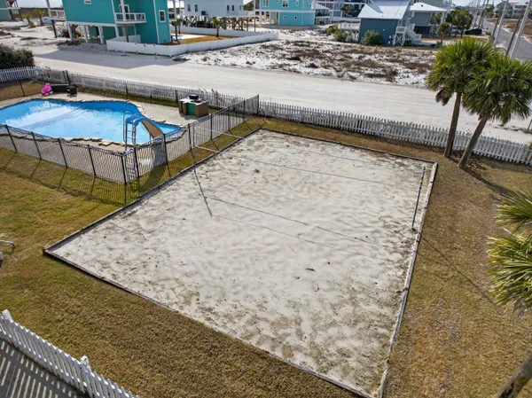 a view of a swimming pool with a chairs