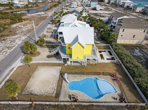 swimming pool view with a outdoor seating space