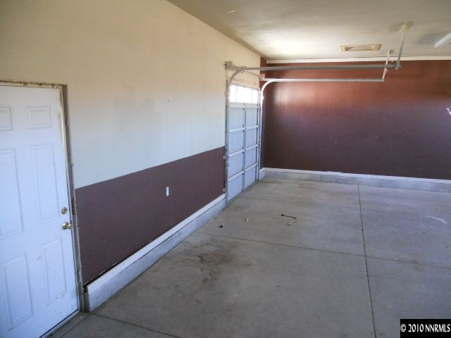 100 John Thomas Lane Reno, NV 89508 - Photo 11 of 13 a view of a room with racks on the wall