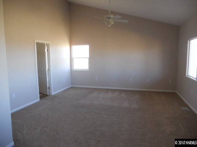 100 John Thomas Lane Reno, NV 89508 - Photo 4 of 13 an empty room with a window
