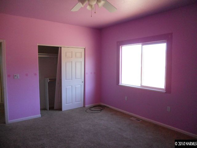 100 John Thomas Lane Reno, NV 89508 - Photo 8 of 13 an empty room with a window