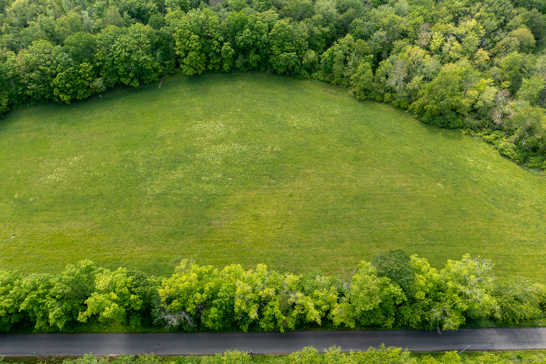Lot 1-060804 Popple Swamp Road Washington Depot, CT 06794 - Photo 4 of 5 a view of a lake from a yard