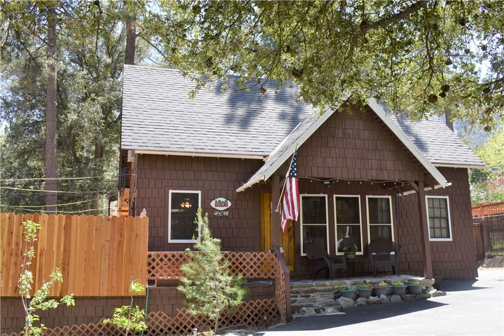 1685 Thrush Road Wrightwood, CA 92397 - Photo 1 of 1 a front view of a house with garden
