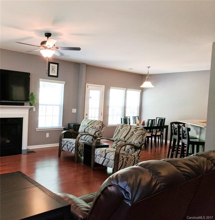 78102 Rillstone Drive Lancaster, SC 29720 - Photo 4 of 22 a living room with furniture fireplace and a flat screen tv